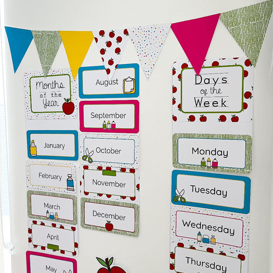 Educational posters with months of the year and days of the week on a white background.