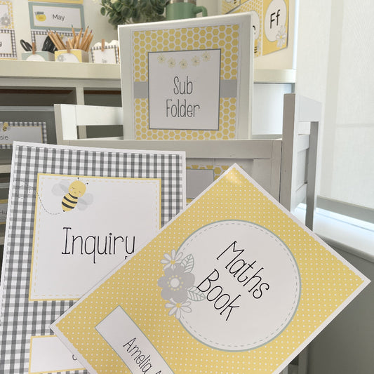 Educational folders with labels on a classroom shelf