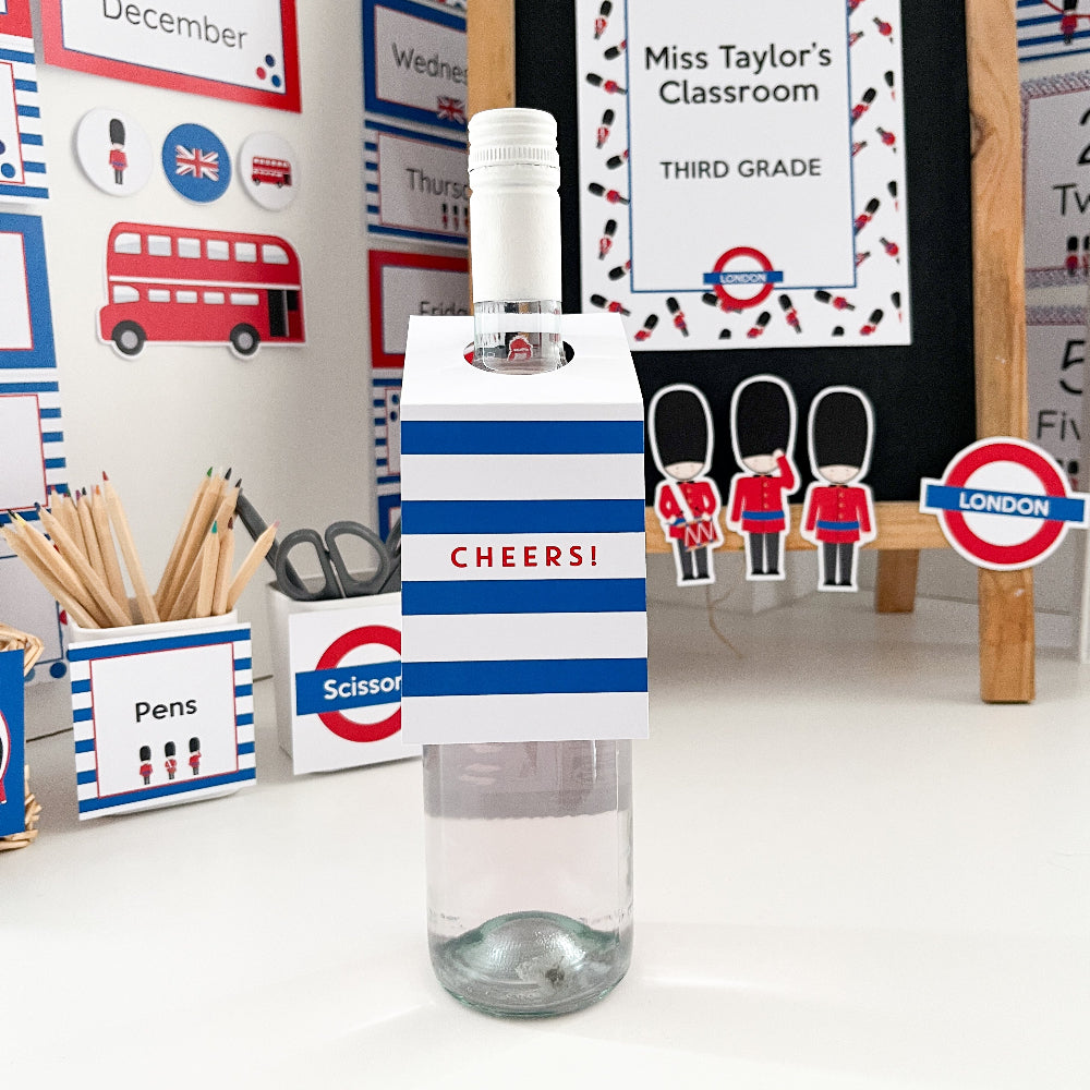 Clear bottle with blue and white striped label in a classroom setting