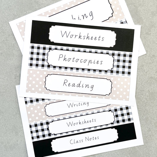 Black, White and Beige patterned binder labels displayed on grey background.