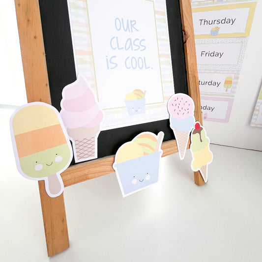 Ice cream-themed bulletin board cut-outs on a wooden stand with a blackboard background