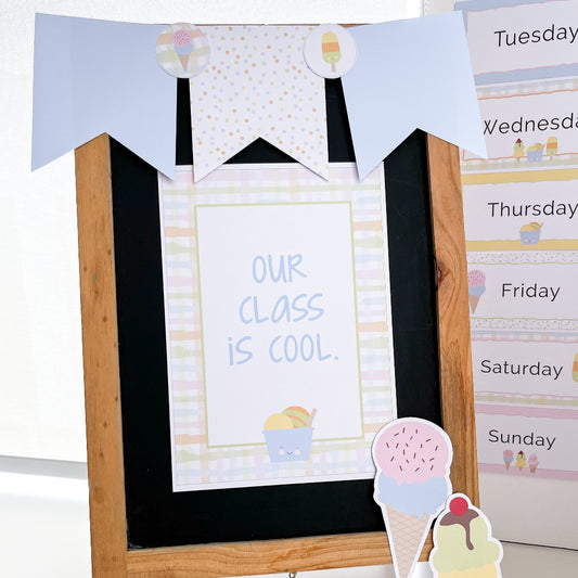 Small chalkboard easel with ice cream-themed decorations on a white background