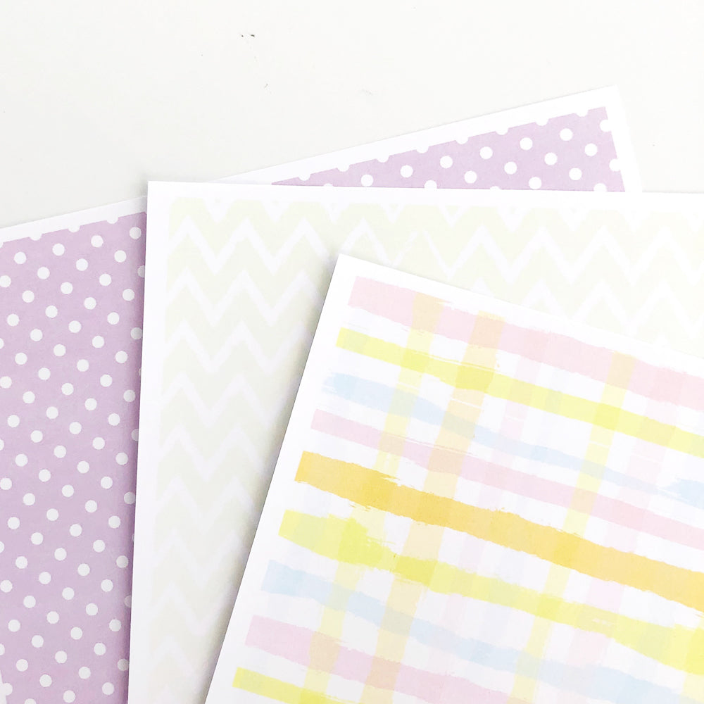 Pastel coloured Easter Papers themed papers displayed on white background.