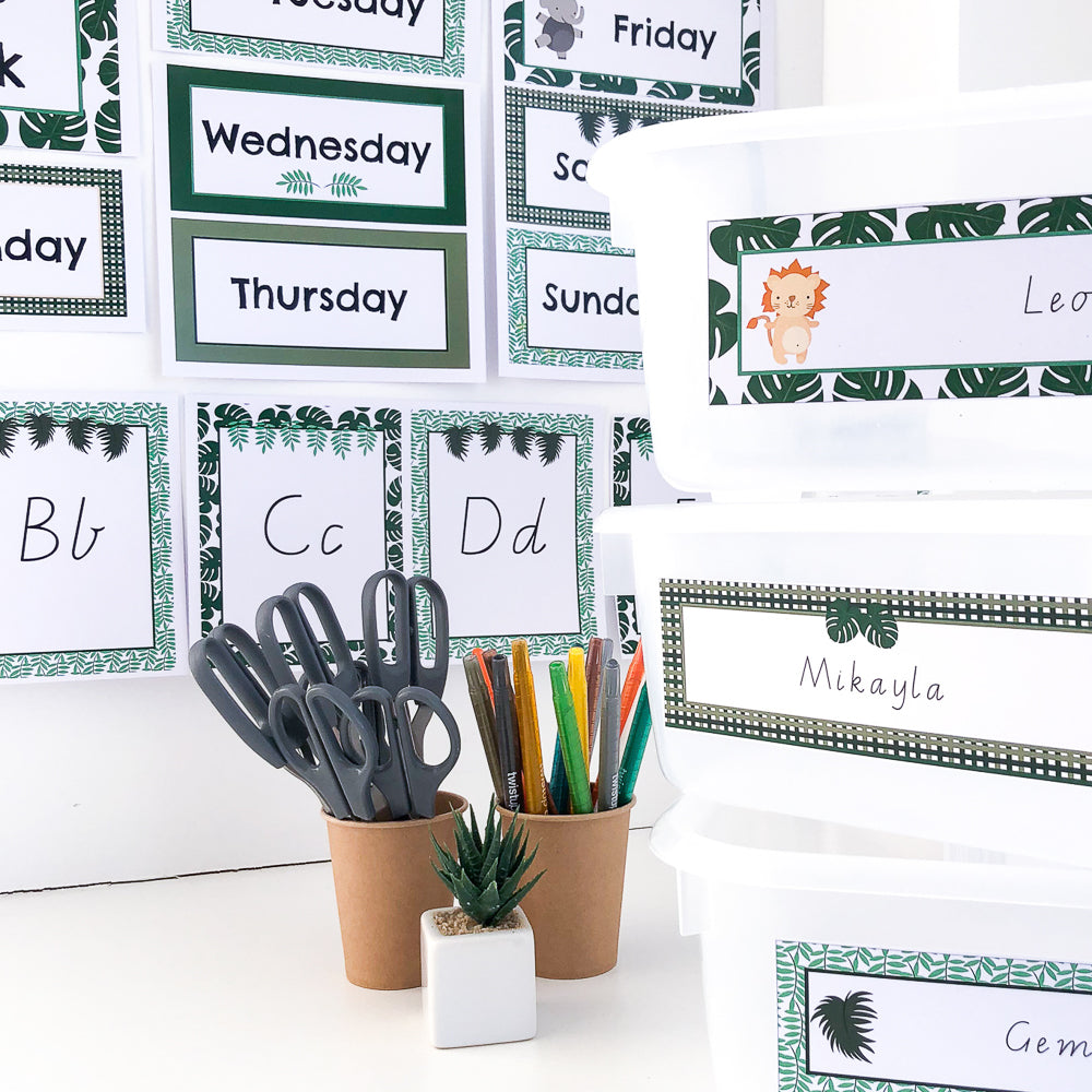 Editable classroom starter pack with green foliage and safari animal themed designs, including alphabet cards, square labels, number cards, and name plates.