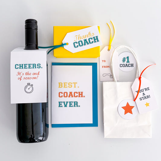 A set of printable gift tags and a greeting card with the text 'Cheers, it's the end of a season! Best Coach ever.' on a wine bottle label, along with two decoration circles.
