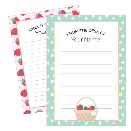 Two note paper sheets with strawberry designs on a white background
