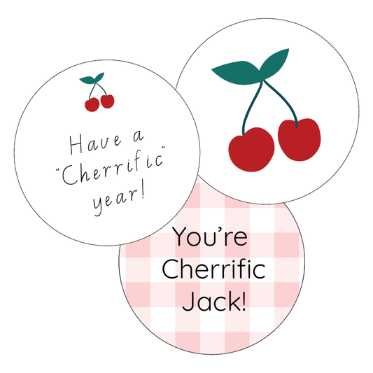 Three circular stickers with cherry designs and text on a white background