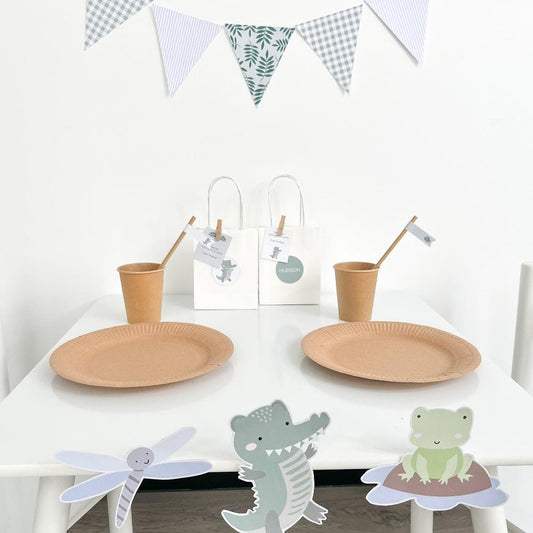 Crocodile or alligator themed party table set up with cute graphics