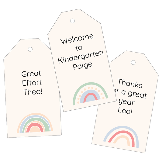 Three gift tags with rainbow designs and personalized text on a white background