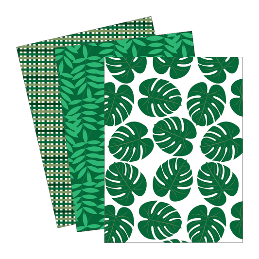 Three green patterned paper sheets with leaf designs on a white background