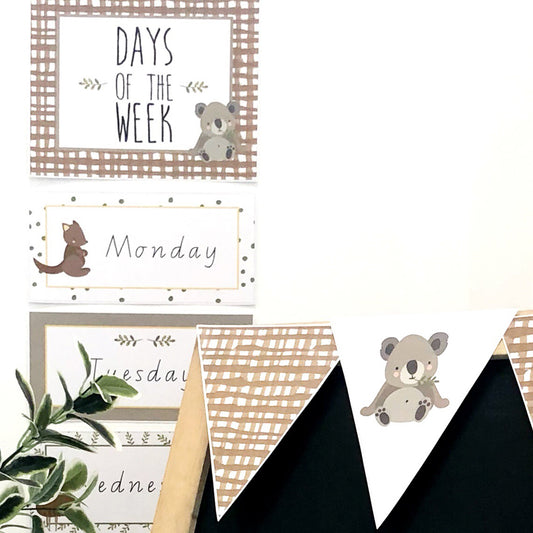 Australian Animal theme prints in a classroom set up on a white wall and blackboard.