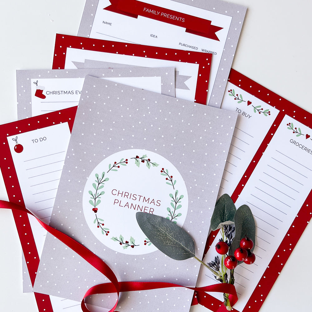 Printable Christmas planner with a red and white design, including cover page and various lists such as 'To Do' and 'Baking List'.