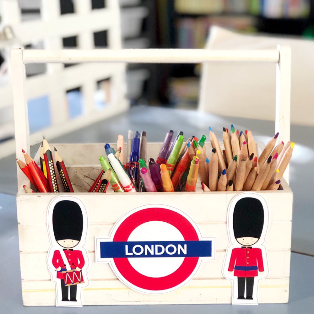 London underground and guards on a classroom caddy full of pencils. 