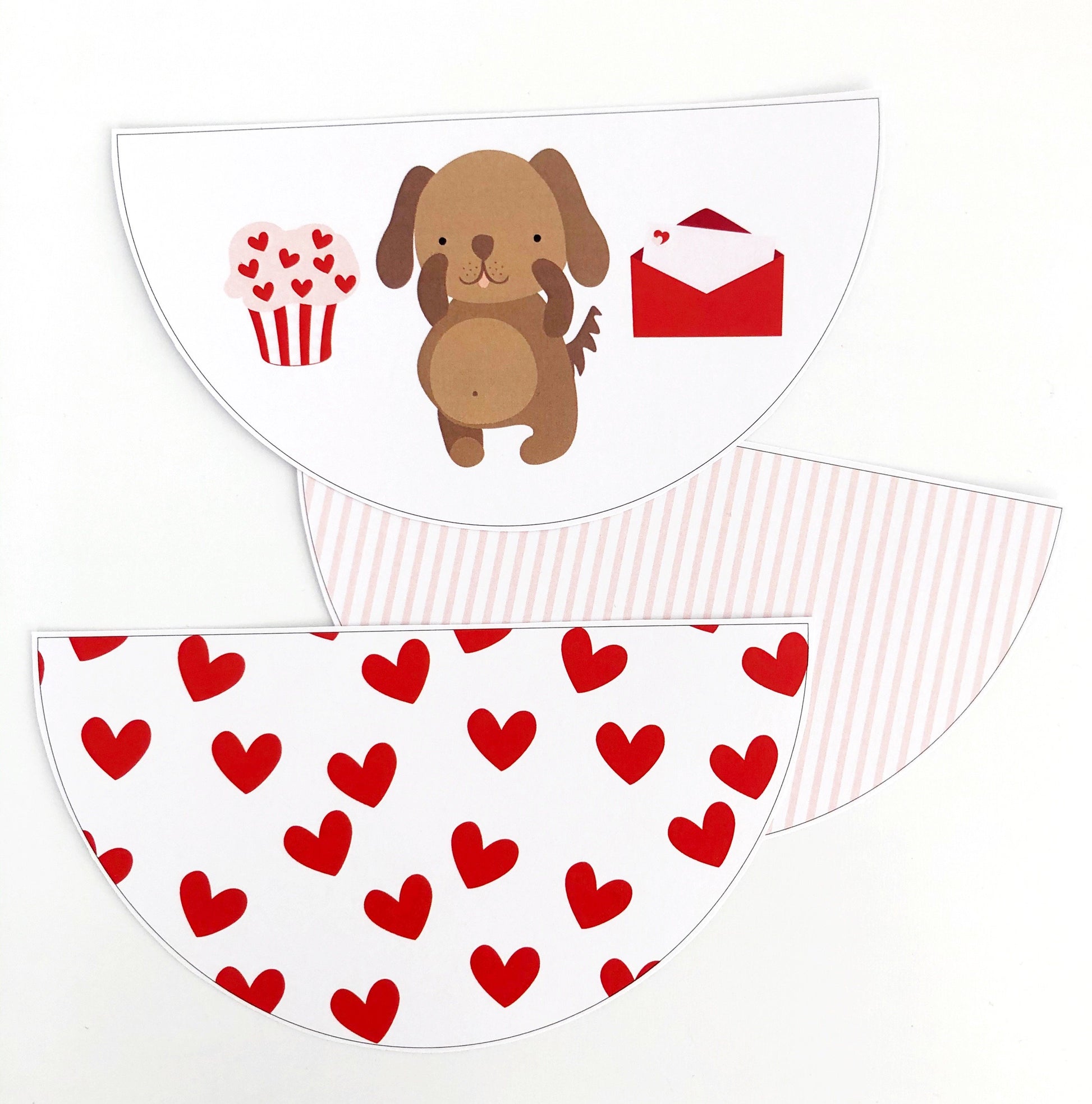 Cute valentines bunting flag with puppy and red love hearts on white background