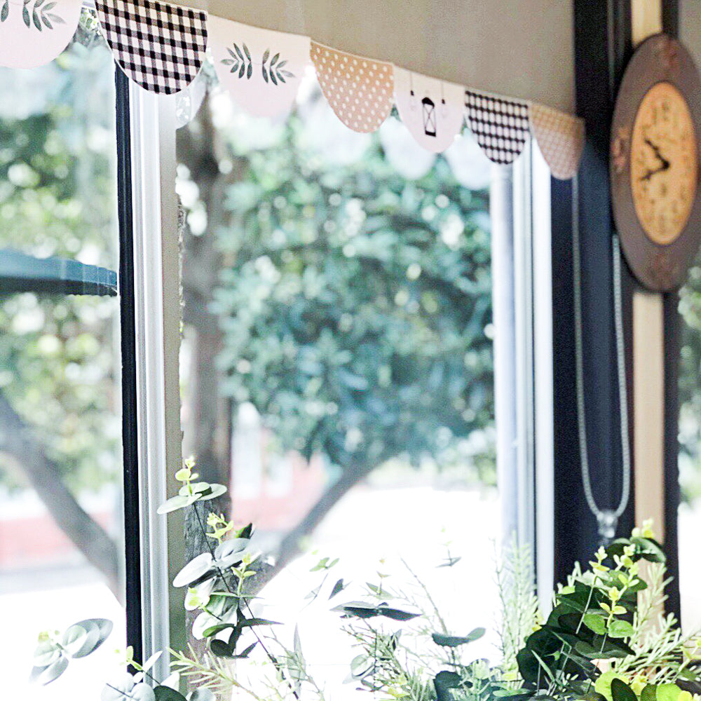 Black, white and beige scalloped shaped border for classroom decorating. 